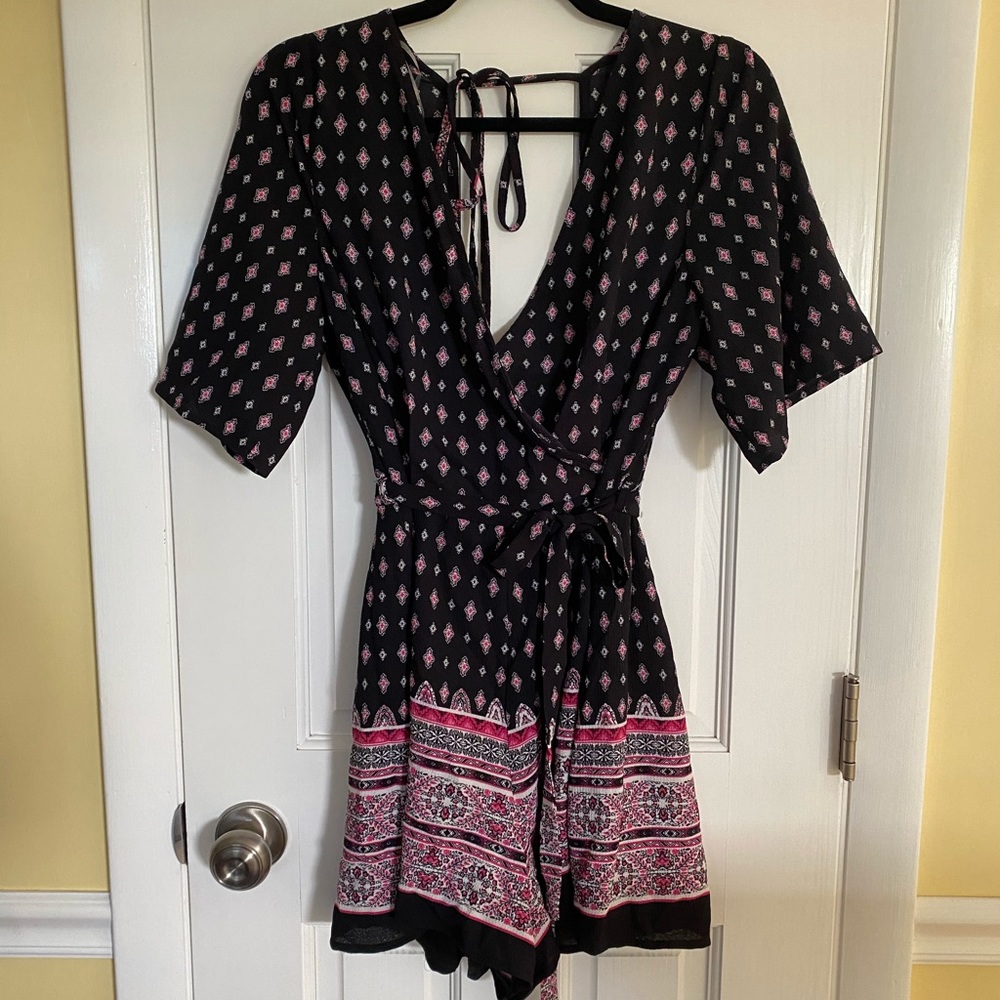 Black, white, and pink romper.